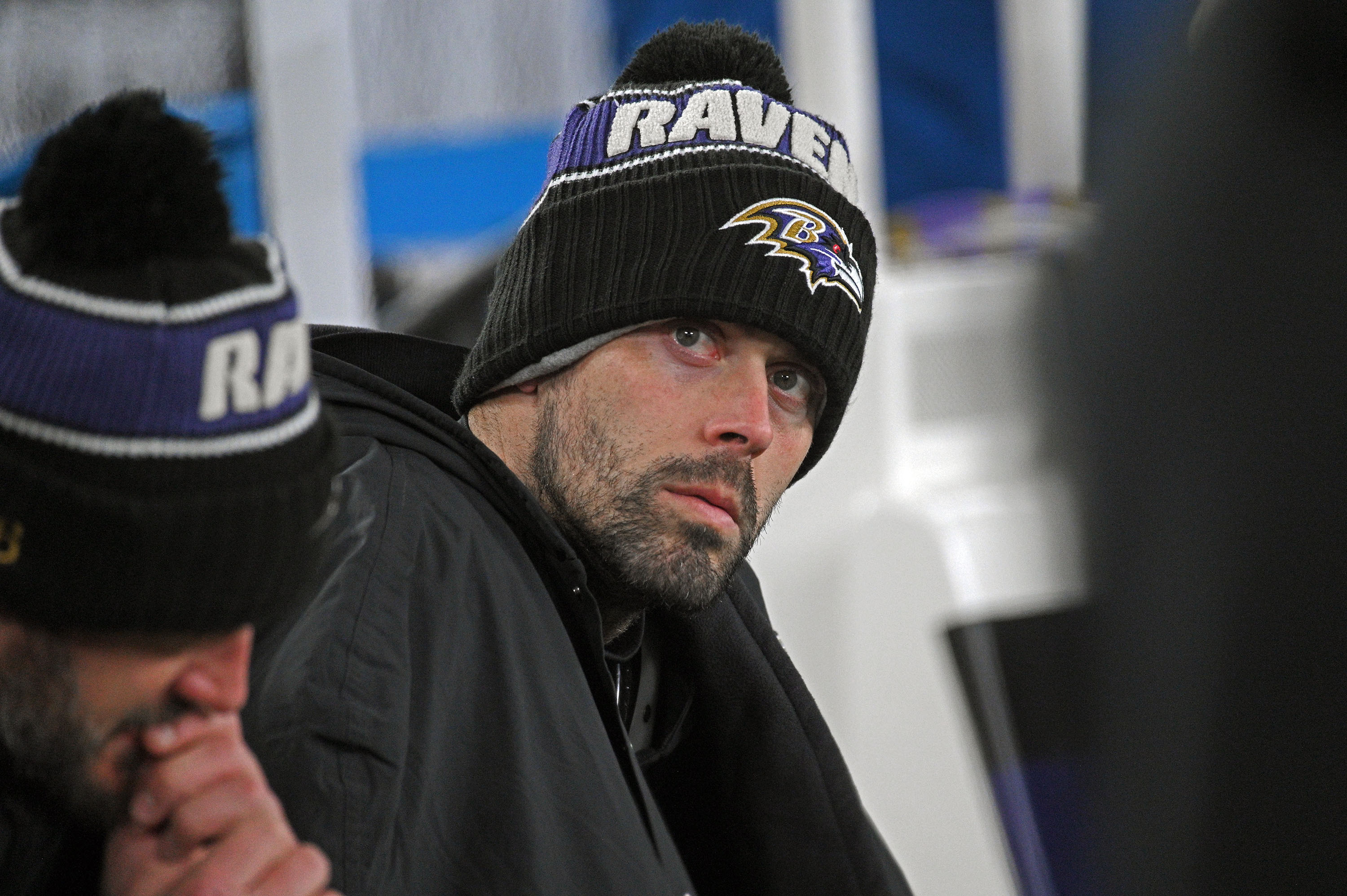Ex-Ravens kicker Justin Tucker sits on the bench in 2024. Tucker recently wrapped up a 10-week suspension stemming from allegations of sexual misconduct against the longtime placekicker.  (Kenneth K. Lam/Staff)